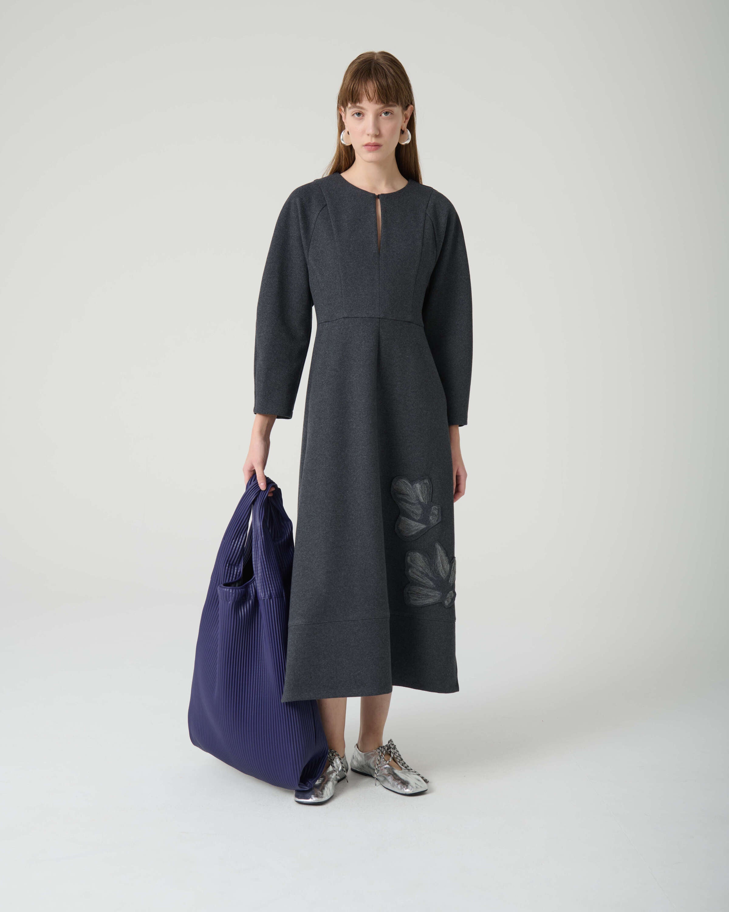 deep gray dress with needle flower