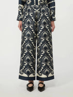 Load image into Gallery viewer, navy Fluid printed silk trousers
