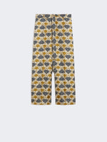 Carregar imagem no visualizador da galeria, mustard fluid printed silk trousers
