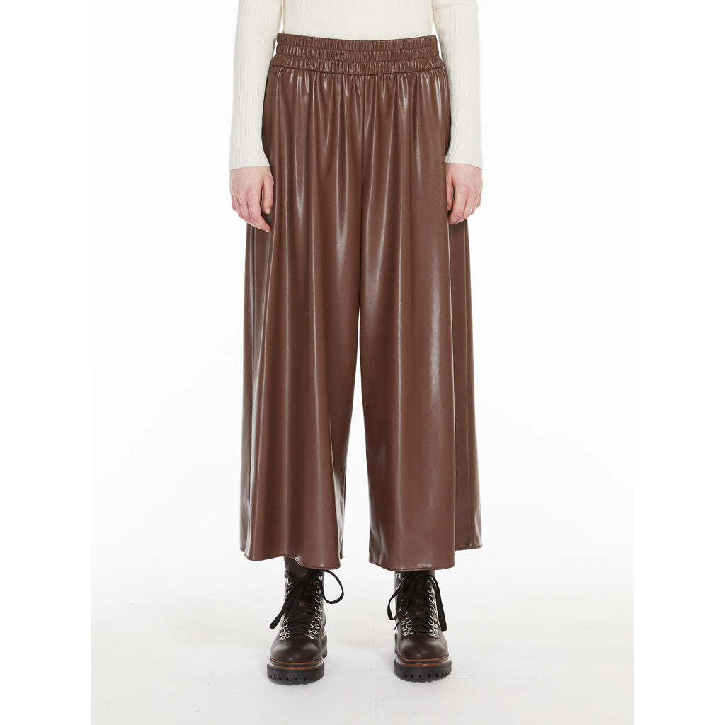 brown coated fabric trousers