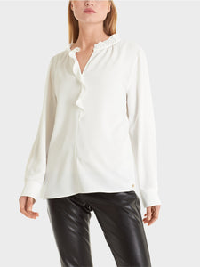 off-white flowing blouse