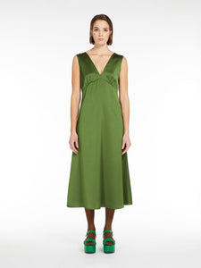 green flared satin dress