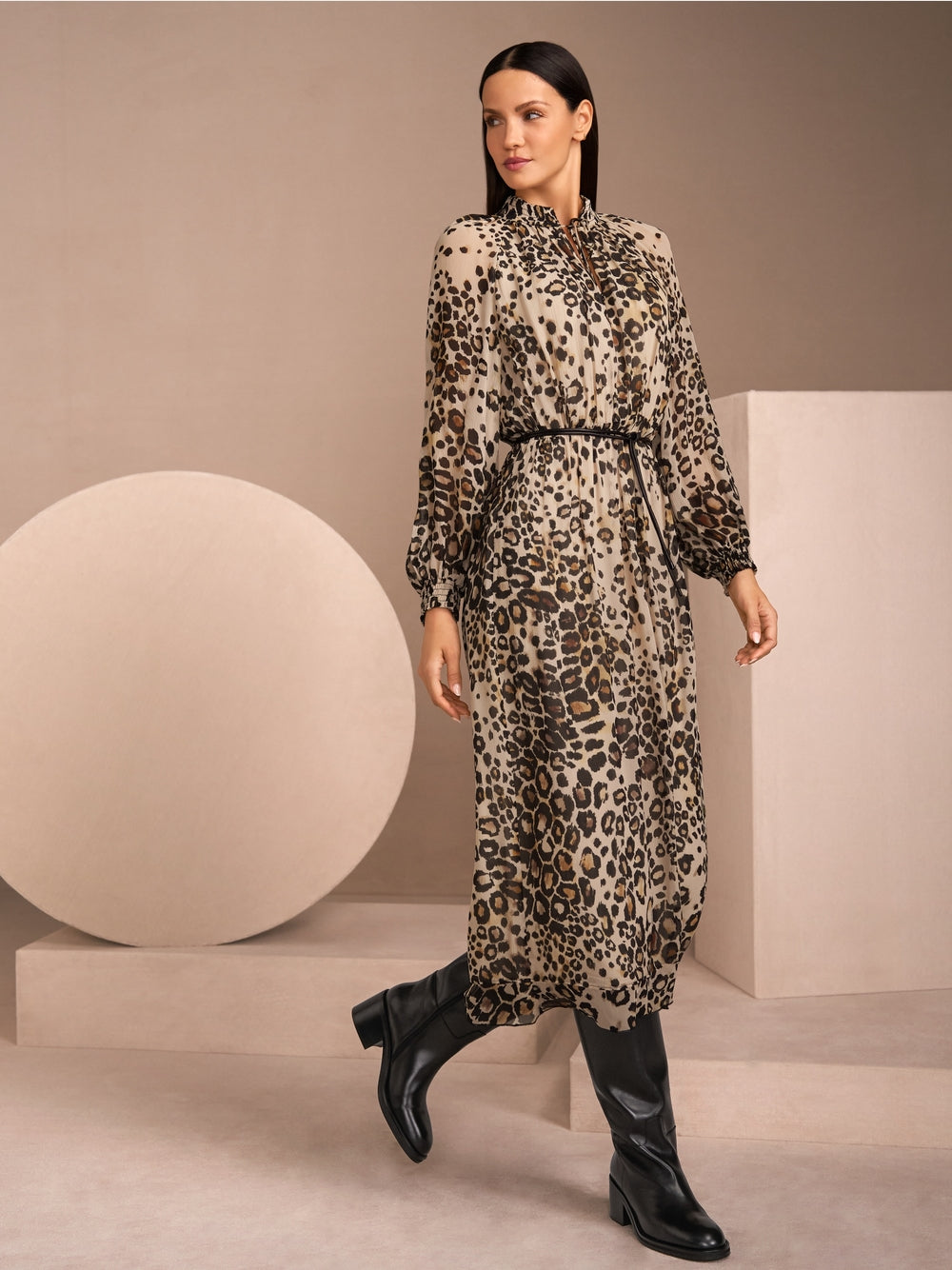 black leather boots with decorative strap